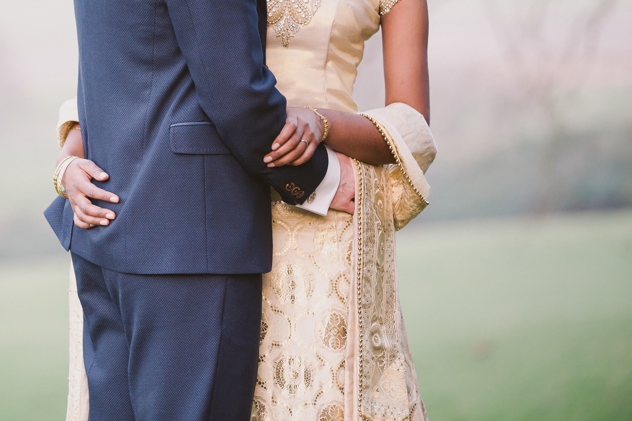 Two People Holding Each Other at a Wedding